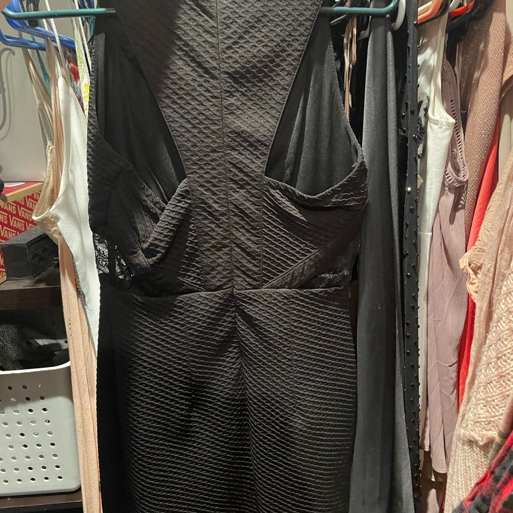 Black dress with lace keyhole short in length worn once purchased at Dillards